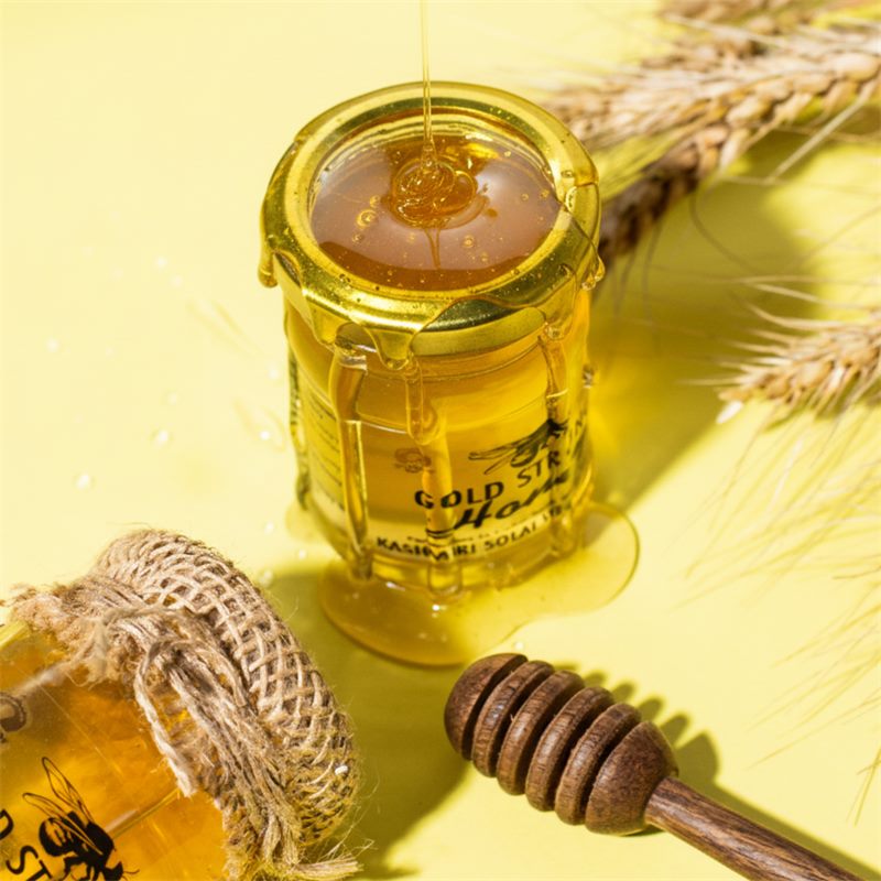 Gold Strong Kashmiri Solai White Honey jar with honey dripping and wooden dipper