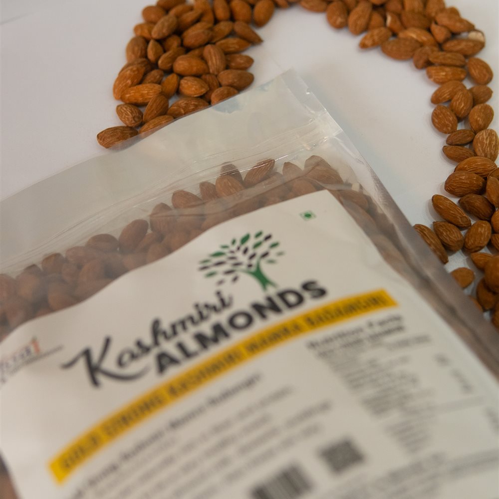 Gold Strong Kashmiri Mamra Almonds pouch with whole almonds